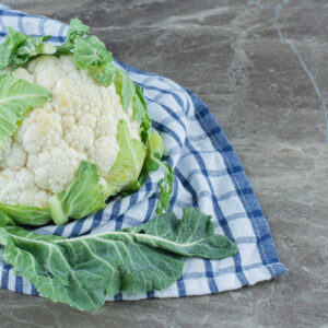 Close up photo Fresh organic cauliflower on grey background. High quality photo